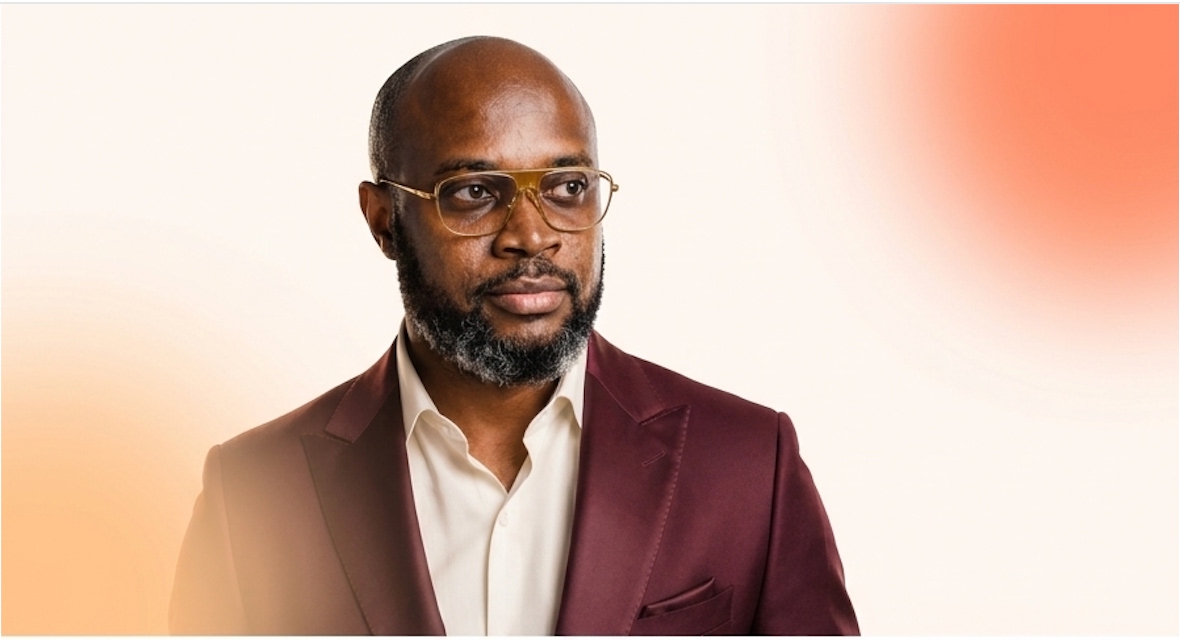 Kwabena Okyire Appianing in a burgundy jacket